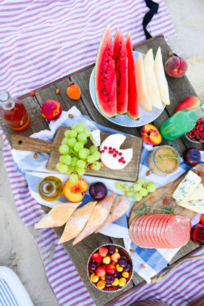 istock Picnic on the beach at sunset in the style of boho 1205591504