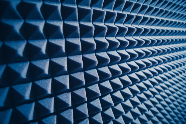 matériau de mousse acoustique pour l’amortisseur de son, fond bleu - textile pattern audio photos et images de collection