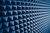 acoustic foam material for sound dampering, blue background