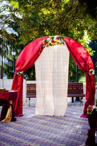 istock Wedding arch with nicely flower decoration 1205600151