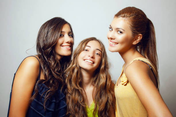 istock Three nice-looking attractive cheerful ladies having fun, Close up studio shot 1205600159