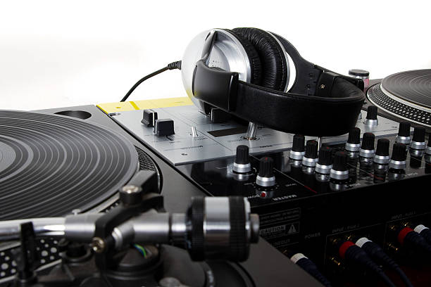 istock Headphones, sound mixer and turntables 120560029