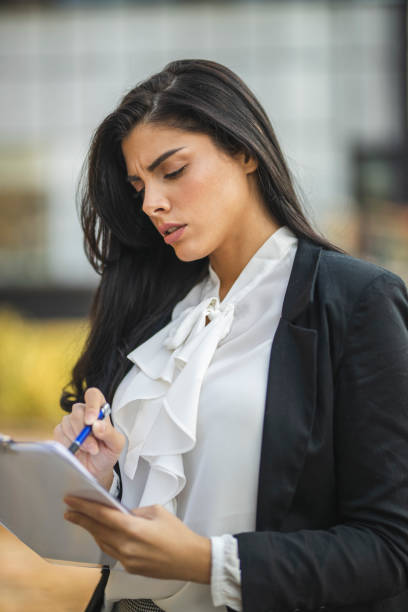 istock Depressed businesswoman 1205601804