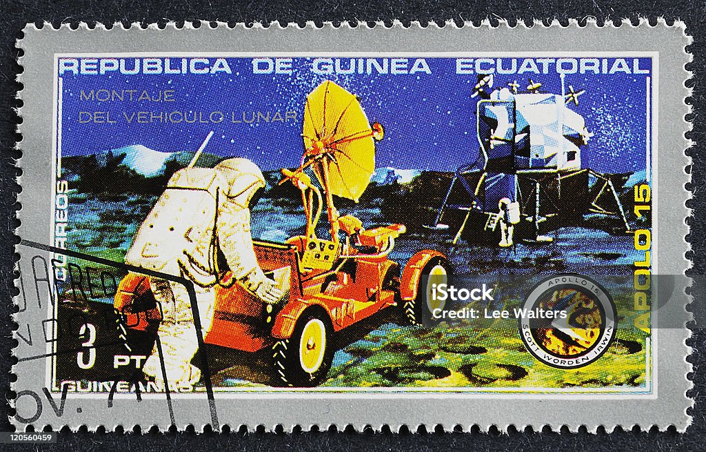 Apollo 15 Postage Stamp Photograph of a canceled postage stamp from the Republica De Guinea celebrating the Apollo 15 Space Mission. Shot on black background. Postage Stamp Stock Photo