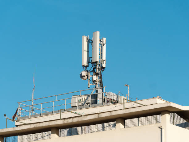 istock Antenna Mobile Communication on the top of a building 1205604866