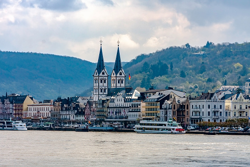 Twin Spires and cityscape seen along the Rhine River in Koblenz, Germany