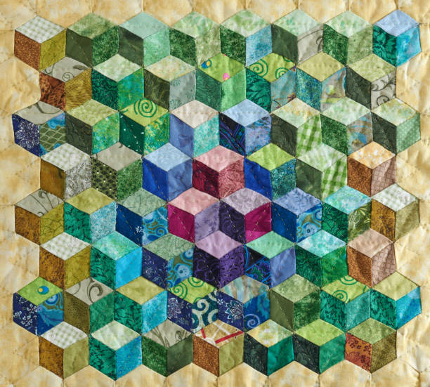 istock Fragment of quilt sewn from diamonds and has view three-dimensional 1205605986