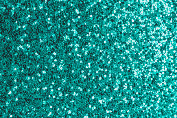 istock Bright turquoise background, small sparkles close-up. A beautiful foundation for sites, layouts and postcards. 1205608529