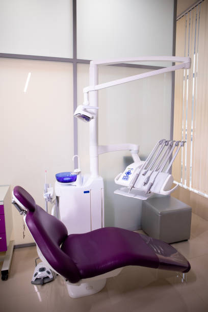 Workplace of dentist with dental unit and chair stock photo