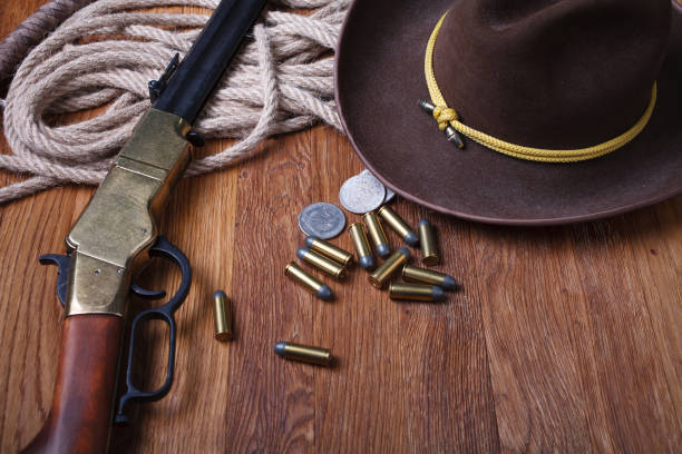 istock Wild west rifle, ammunition and sheriff badge 1205614132
