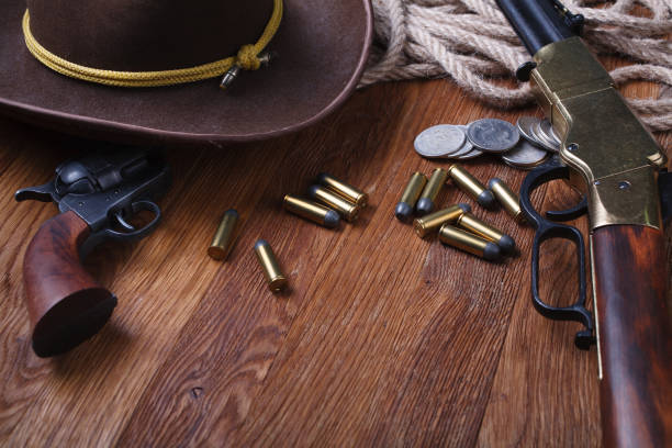 istock Wild west rifle, ammunition and sheriff badge 1205614653