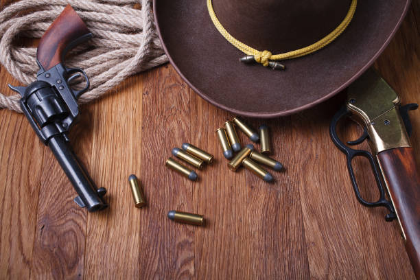 istock Wild west rifle, ammunition and sheriff badge 1205614681