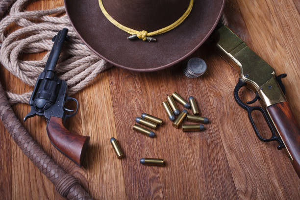 istock Wild west rifle, ammunition and sheriff badge 1205614691
