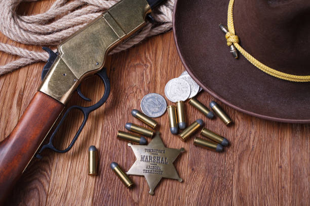 istock Wild west rifle, ammunition and sheriff badge 1205614699