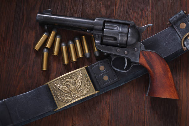 istock Old western revolver with cartridges 1205615712