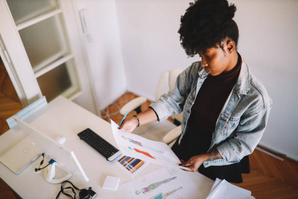 istock Female designer working on a project in the office 1205621280