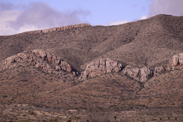 istock Beautiful Semi-Arid Mountainous Landscape Against Dramatic Cloudy Sky 1205626156