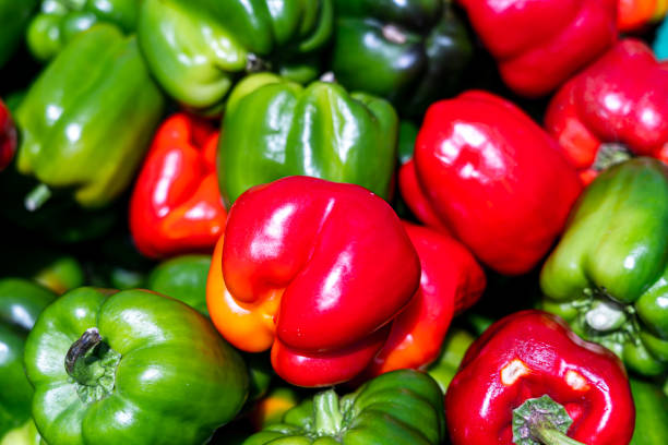 istock Fresh Bell Peppers on the Open Market, natural background 1205629790