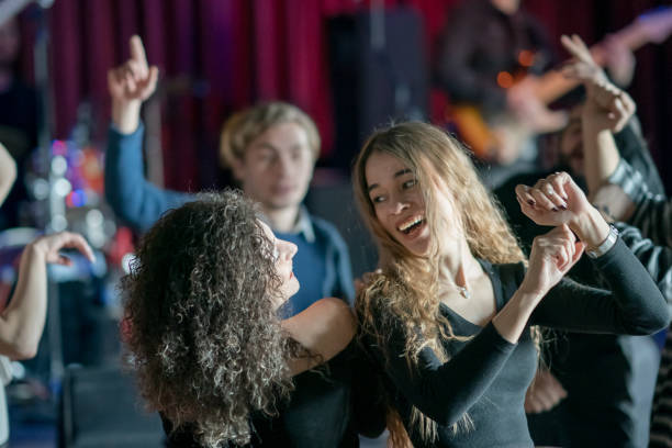 istock Friends dancing in the pub 1205629988