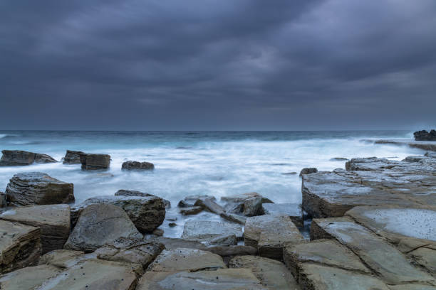 istock Overcast and Rocky Morning Seascape 1205630981