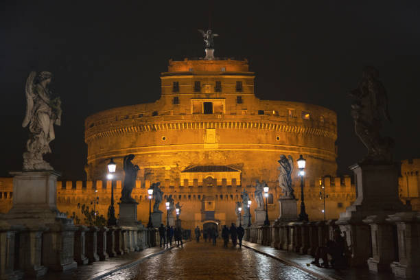 Rome, Italy - February 02, 2020: The Mausoleum of Hadrian, usually known as Castel Sant'Angelo is a towering cylindrical building in Rome, Italy. It was initially commissioned by the Roman Emperor Hadrian as a mausoleum for himself and his family. The building was later used by the popes as a fortress and castle, and is now a museum.