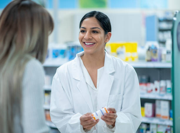 istock Pharmacist Explaining Medication stock photo 1205632954