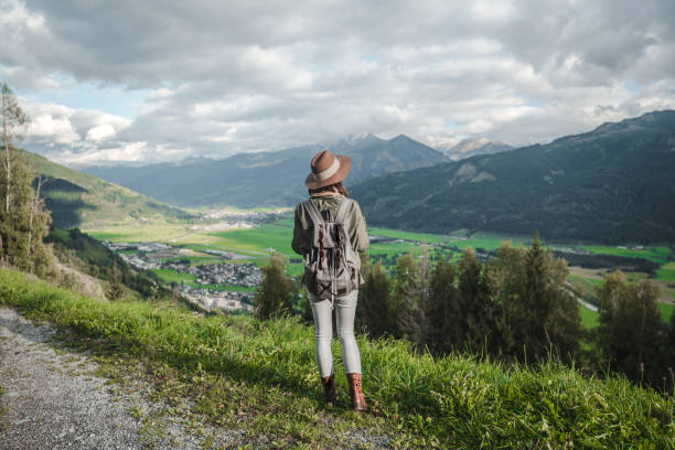istock Young tourist with a backpack in Austria 1205633491