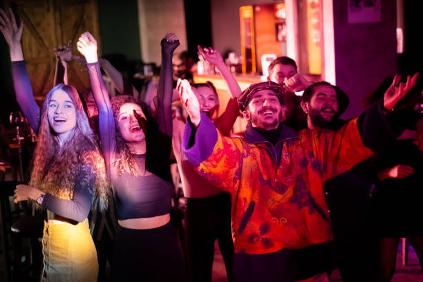 istock young people dancing at the nightclub 1205638450