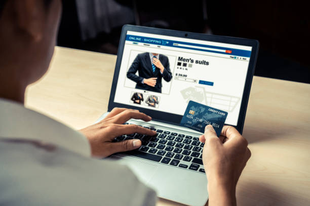 istock Young man use credit card for online shopping 1205638556