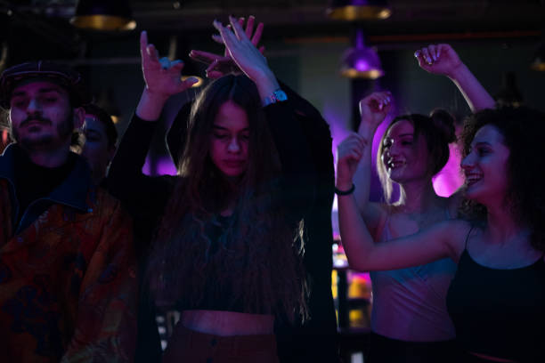 istock young people dancing at the nightclub 1205639673