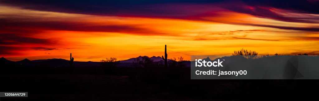 Panoramic image of a sunset over the Sonoran Panoramic image of a sunset over the Sonoran Desert of Arizona. Scottsdale - Arizona Stock Photo