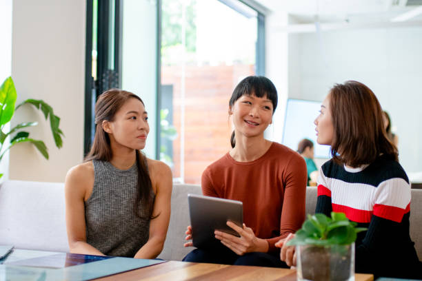 istock Team of young women in a modern co-working office 1205646547