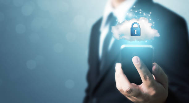 istock Protection network security mobile smart phone and safe your data concept. Digital crime by an anonymous hacker 1205648876