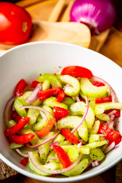 istock Side BBQ Vegetable Salad on Cutting Board Plated 1205649519