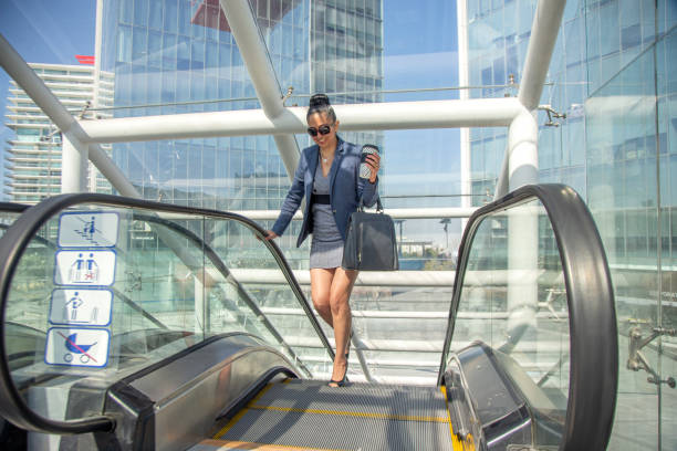 istock Latina executive woman walking to work 1205649713