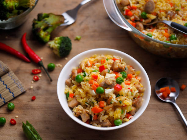 Chinese fried rice with chicken and vegetables.