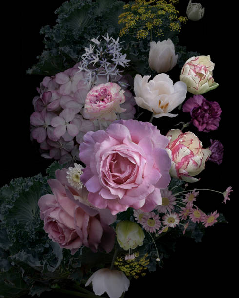 istock Vintage garden flowers and decorative herbs on black background. 1205655725