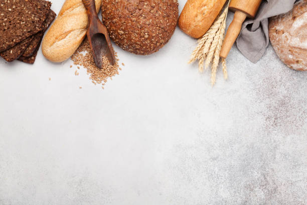istock Various bread with wheat, flour and cooking utensils 1205659128