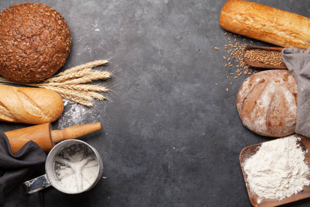 istock Various bread with wheat, flour and cooking utensils 1205659183