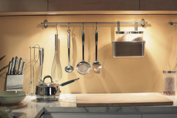 istock kitchenwares hanging on the wall 1205660519