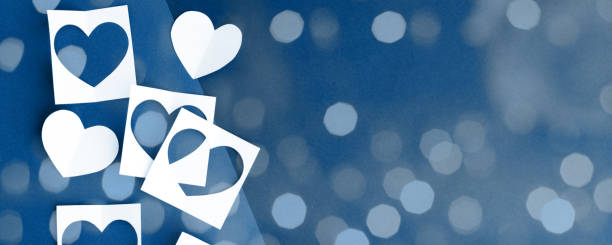 istock Paper hearts on classic blue background. Empty place for copy space for text. mock-up, minimal concept of romance winter february holiday. saint Valentine day, banner 1205661277