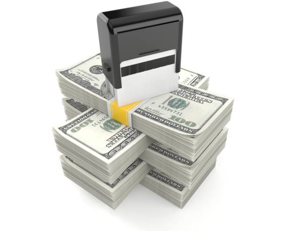 Rubber stamp on stack of money Rubber stamp on stack of money isolated on white background. 3d illustration one hundred dollar stamp stock pictures, royalty-free photos & images
