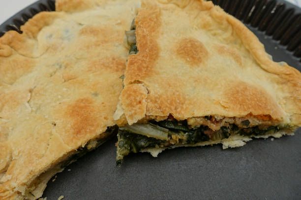 istock Savory pie with chard leaves and anchovies  Baking 1205665945