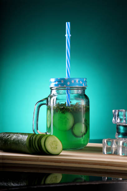 Fresh Cucumber Juice in a Mason Jar with ice cubes