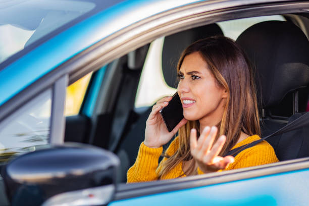 istock Furious woman stucked in traffic jam. 1205681998