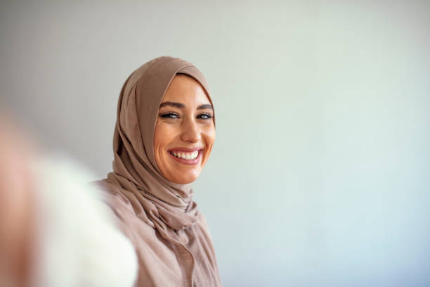 istock Muslim caucasian woman taking selfie. 1205682039
