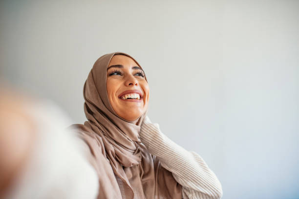 istock Muslim caucasian woman taking selfie. 1205682753