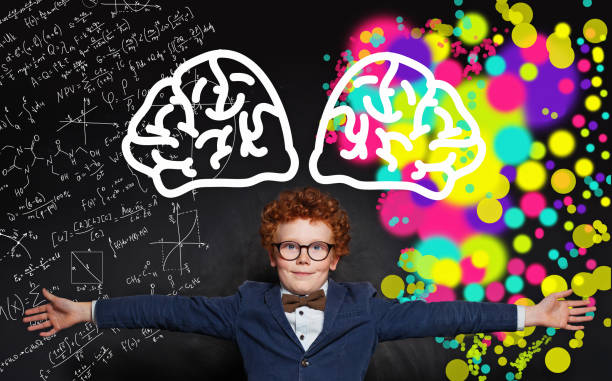 istock Child with ginger hair wearing school uniform and glasses 1205689947