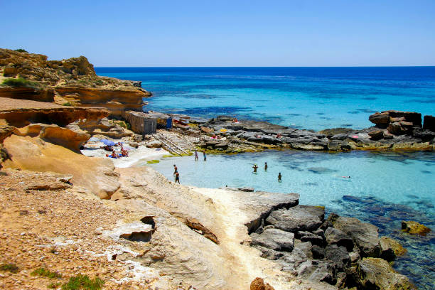 istock clear water sea beach with rocks summer mediterranean 1205692649
