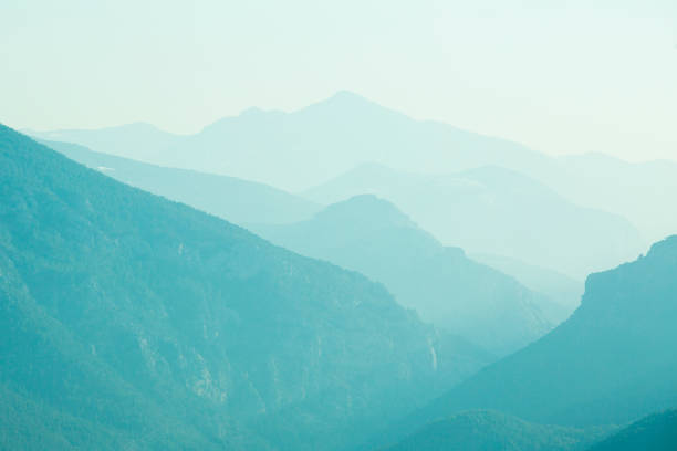 istock skyline of turquoise aquamarine mountains with mist 1205693634